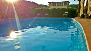 Bazén v ubytování Chalet "Rec dels Noguers" nebo v jeho okolí