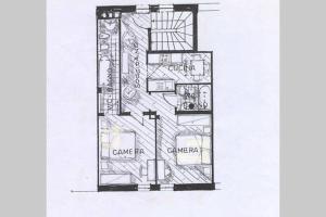 um desenho a preto e branco de uma planta de piso em Casa Monteggia em Dobbiaco