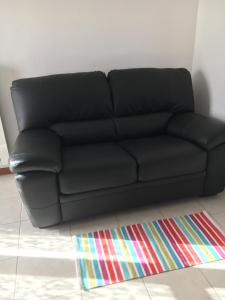 A seating area at Residence IL PORTO