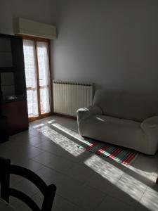 A seating area at Residence IL PORTO