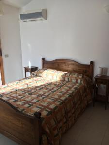 A bed or beds in a room at Residence IL PORTO