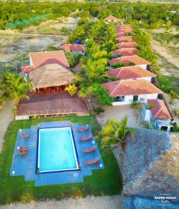 an aerial view of a resort with a swimming pool at Paper Moon Kudils in Arugam Bay