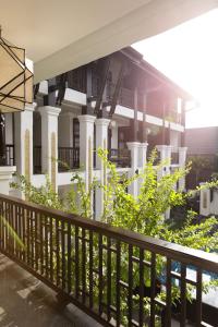 a porch of a house with a fence at Thai Akara - Lanna Boutique Hotel in Chiang Mai +63 photos