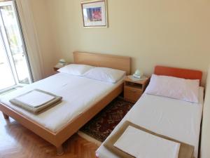 Posteľ alebo postele v izbe v ubytovaní Villa Bakara