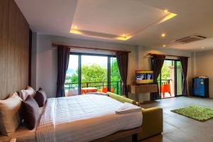 Postel nebo postele na pokoji v ubytování Phi Phi Top View Resort + 37 fotografií