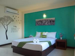 Forum House Hotel Krabi客房内的一张或多张床位