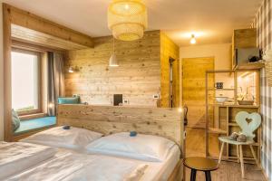 Säng eller sängar i ett rum på Residence Telemark