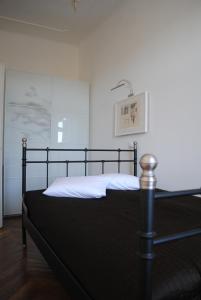 Postel nebo postele na pokoji v ubytování Kunsthaus Apartments