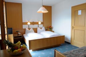 Postel nebo postele na pokoji v ubytování Hotel Lengsteinerhof