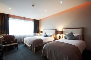 Vuode tai vuoteita majoituspaikassa Rochestown Park Hotel & Leisure Centre