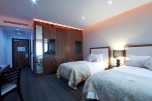 Vuode tai vuoteita majoituspaikassa Rochestown Park Hotel & Leisure Centre