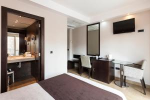 TV a/nebo společenská místnost v ubytování Sandos Monaco - Adults Only