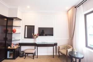 Μια τηλεόραση ή/και κέντρο ψυχαγωγίας στο Dinh Elegant Hanoi Hotel