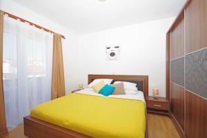 Postel nebo postele na pokoji v ubytování Apartments Imgrund