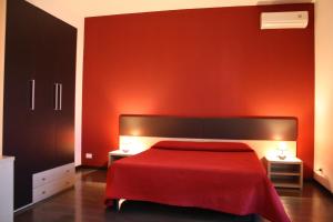 Letto o letti in una camera di B&B 5 Sensi