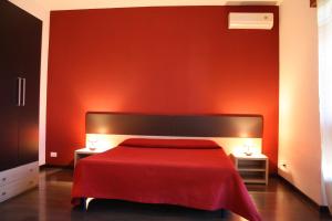 Letto o letti in una camera di B&B 5 Sensi