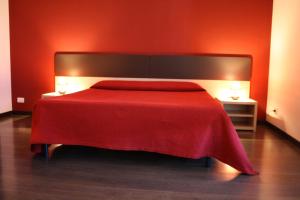 Letto o letti in una camera di B&B 5 Sensi