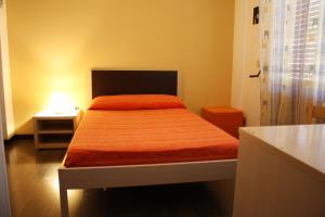 Letto o letti in una camera di B&B 5 Sensi