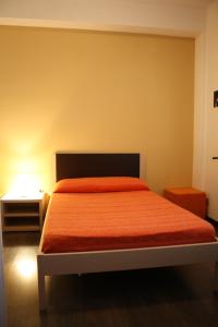 Letto o letti in una camera di B&B 5 Sensi