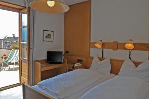Postel nebo postele na pokoji v ubytování Hotel Lengsteinerhof