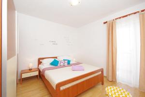 Postel nebo postele na pokoji v ubytování Apartments Imgrund