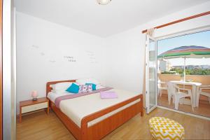Postel nebo postele na pokoji v ubytování Apartments Imgrund