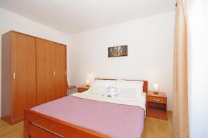 Postel nebo postele na pokoji v ubytování Apartments Imgrund