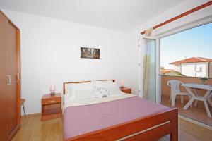 Postel nebo postele na pokoji v ubytování Apartments Imgrund