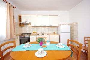 Kuchyň nebo kuchyňský kout v ubytování Apartments Imgrund