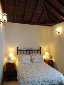 Ένα ή περισσότερα κρεβάτια σε δωμάτιο στο Casa Rural La Florida