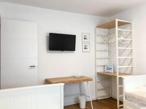 Μια τηλεόραση ή/και κέντρο ψυχαγωγίας στο Zone23 Home