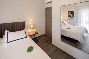 Postel nebo postele na pokoji v ubytování Hotel Milna Osam - Adults Only