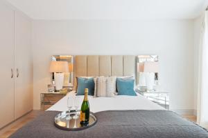 Кровать или кровати в номере Exclusive City Centre Apartment