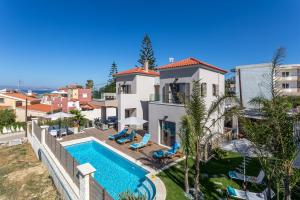 an aerial view of a villa with a swimming pool at Superior Villa Marina Mare with Sauna Hammam & Parking in Nea Kydonia