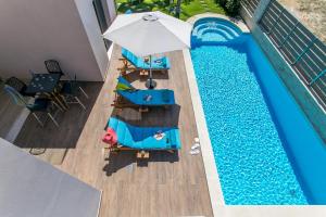 Nea KydoniaにあるSup Villa Marina Mare Sauna-Hammam & Heated Pool - BBQのギャラリーの写真 +82枚の写真