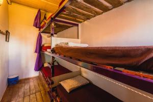 Postel nebo postele na pokoji v ubytování The Trip Hostel