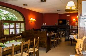 A restaurant or other place to eat at Hotel Can Blanc