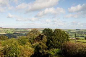 a view from the top of a hill with trees at The Cow & Calf by Innkeeper's Collection in Ilkley