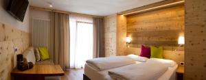 Ένα ή περισσότερα κρεβάτια σε δωμάτιο στο Hotel Pider