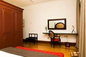 Cama ou camas em um quarto em Pousada Mosteiro de Guimaraes