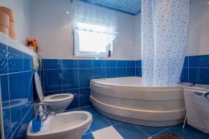 Kúpeľňa v ubytovaní Ferienhaus Bucic