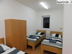 Posteľ alebo postele v izbe v ubytovaní Apartmány Horní Planá