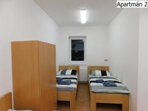 Posteľ alebo postele v izbe v ubytovaní Apartmány Horní Planá