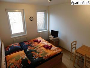 Posteľ alebo postele v izbe v ubytovaní Apartmány Horní Planá