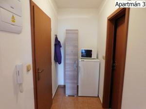 Kuchyňa alebo kuchynka v ubytovaní Apartmány Horní Planá
