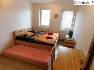 Posteľ alebo postele v izbe v ubytovaní Apartmány Horní Planá