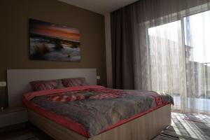 Ένα ή περισσότερα κρεβάτια σε δωμάτιο στο Apartment Cristian 2