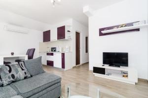 Kuchyň nebo kuchyňský kout v ubytování Apartments Stermasi