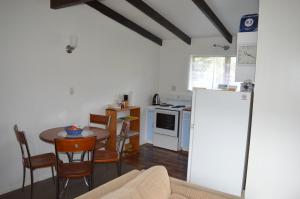 A kitchen or kitchenette at Hahei Beach Escape