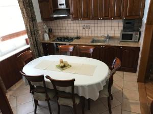 Kuchyň nebo kuchyňský kout v ubytování Apartment Abba